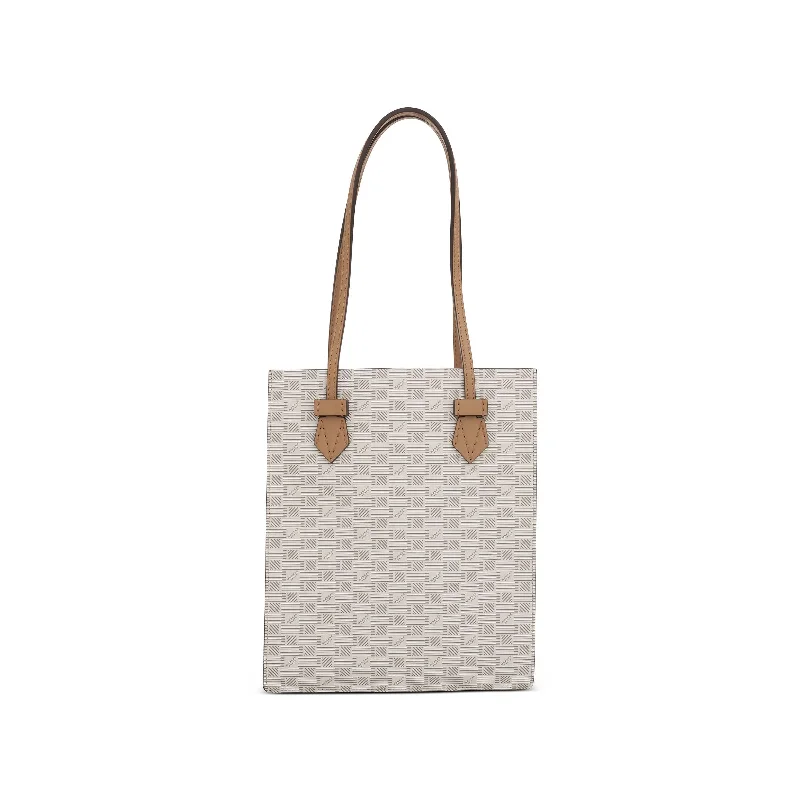 women's handbag with diagonal stripe pattern -Cannes Vertical Tote MM with Stripes in Champagne