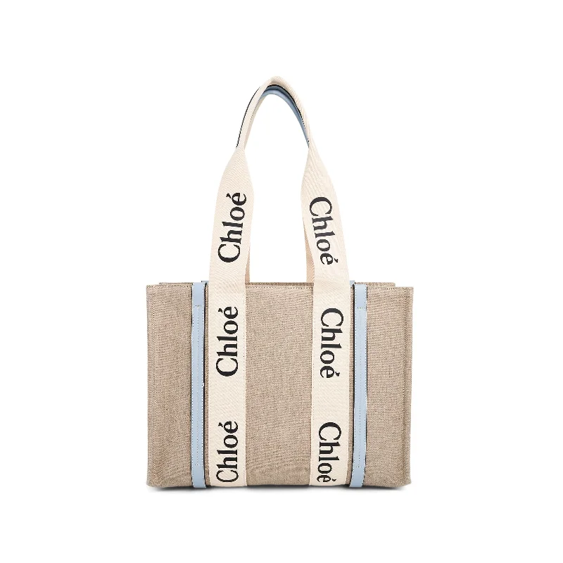 women's handbag with polished gold hardware -Chloe Medium Woody Tote Bag in White Blue