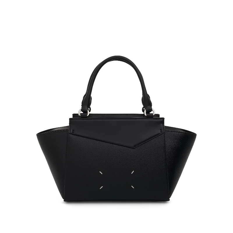 women's handbag with round handle design -Snatched Tote Bag in Black