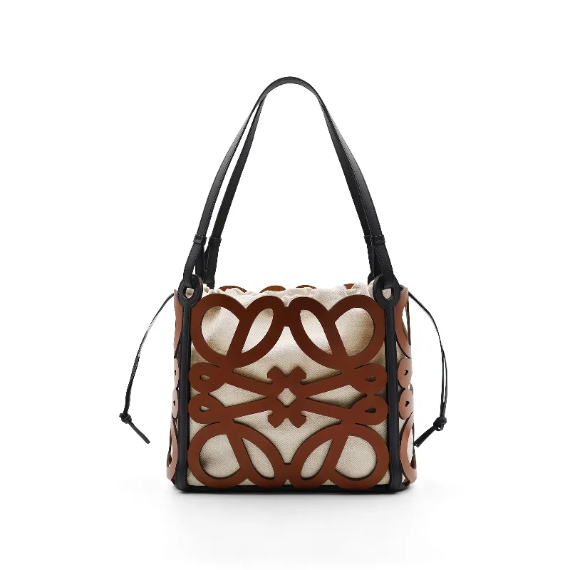 women's handbag with zippered central compartment -Small Anagram Cut Out Tote Bag in Calfskin in Tan