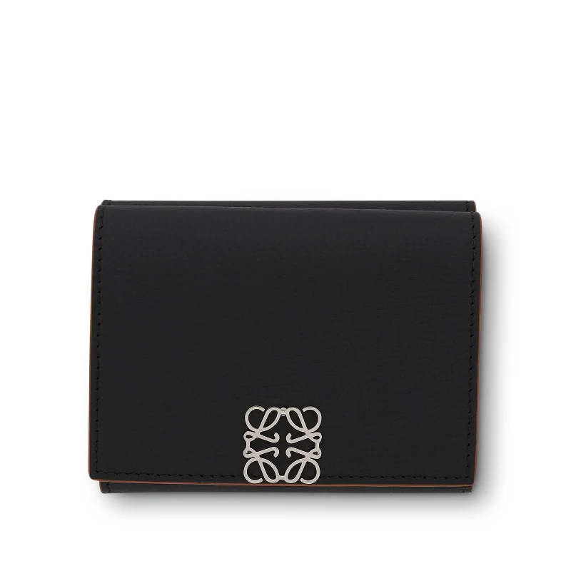 women's wallet with roomy interior -Anagram Trifold Wallet Pebble Grain Calfskin in Black