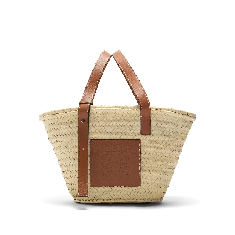 women's handbag with contrasting color interior -Medium Basket Bag in Palm Leaf and Calfskin in Natural/Tan