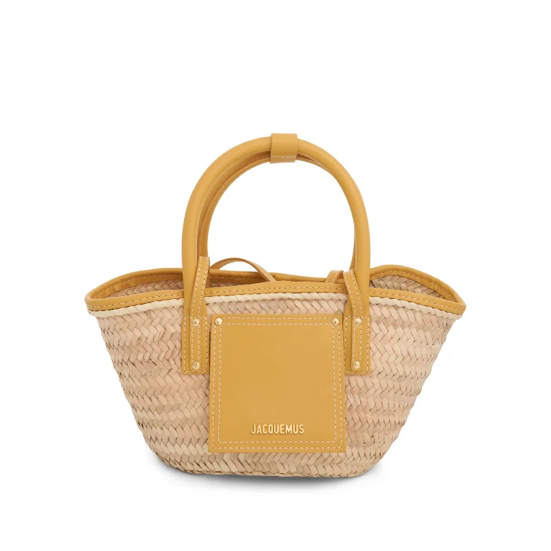 women's handbag with large, soft leather handles -Le Petit Panier Soleil Straw & Leather Bag in Dark Yellow