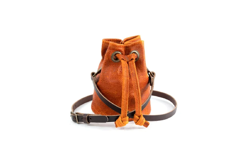 women's bucket bag with foldable design -LEATHER BUCKET BAG - SMALL - TANGERINE BISON