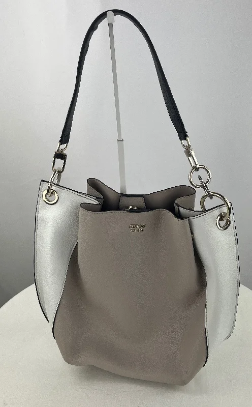 women's dumpling bag with bold details -Guess Women's Taupe White Leather Crossbody Hobo Bag Purse