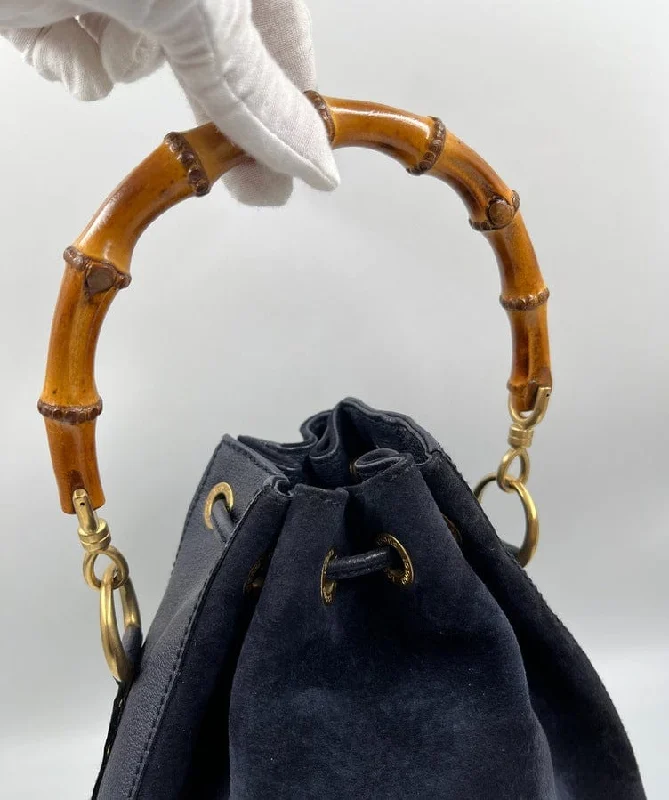 women's bucket bag with structured body -Gucci Bucket Bag with Bamboo Handle