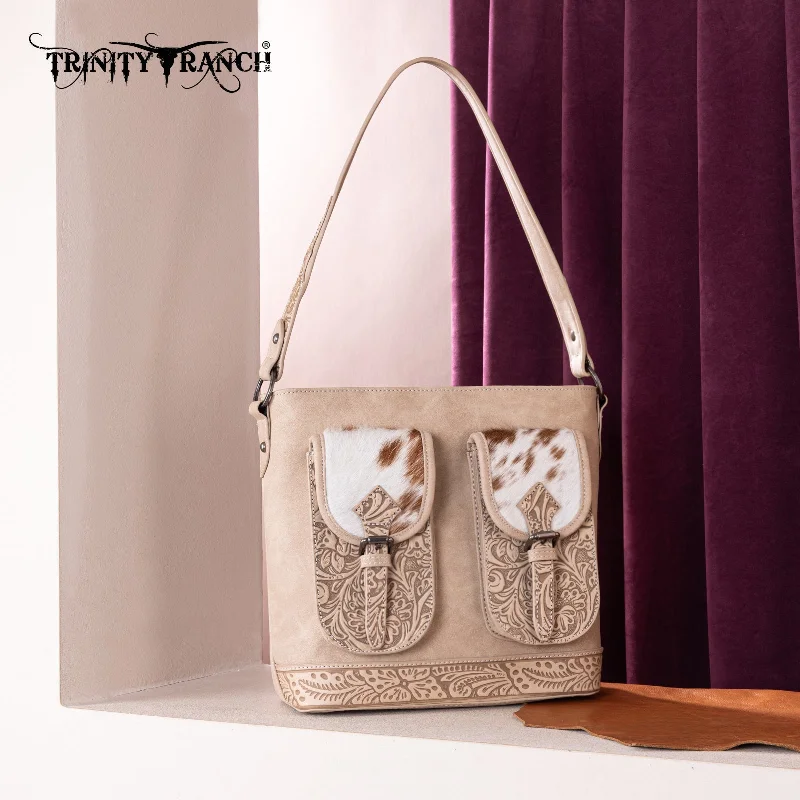 women's handbag with trendy monogram pattern -TR185G-918  Trinity Ranch Genuine Hair-On Cowhide Tooled Concealed Carry Hobo Bag- Tan