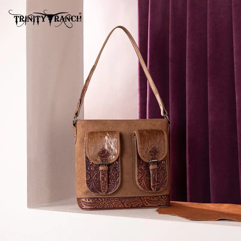 women's handbag with bold design features -TR185G-918  Trinity Ranch Genuine Hair-On Cowhide Tooled Concealed Carry Hobo Bag- Brown