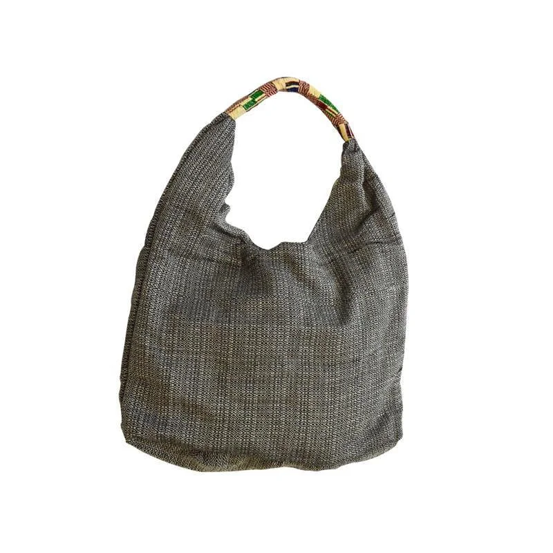 women's dumpling bag with statement detail -Black and White Woven Hobo