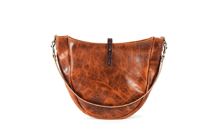 women's dumpling bag with subtle charm -CELESTE LEATHER HOBO BAG - MEDIUM - PEANUT BISON