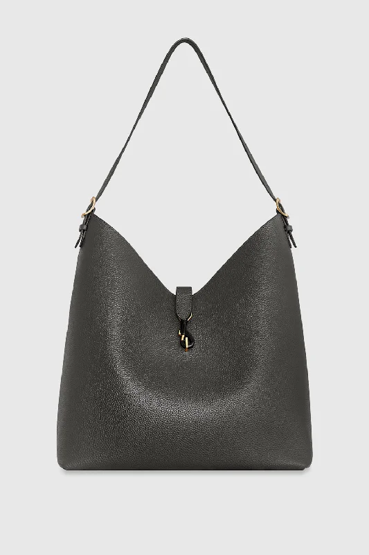 women's dumpling bag with button closure -Megan Hobo