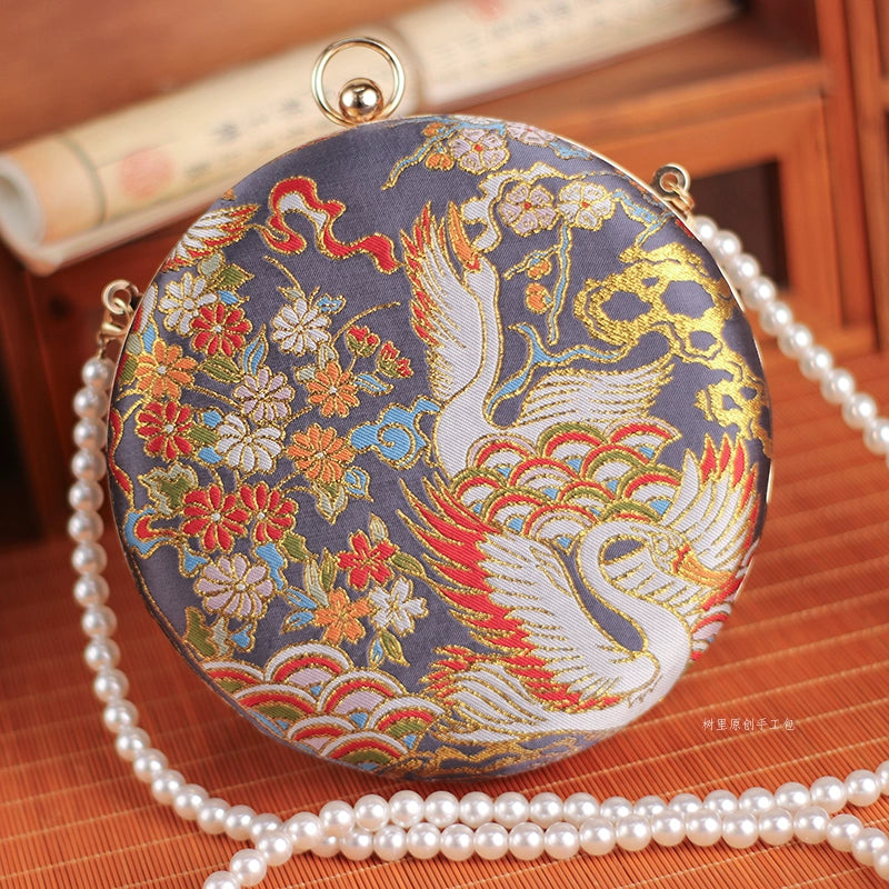 women's wallet with inner zip pocket -Jin Hé 金鹤 Golden Crane Hardshell Round Purse